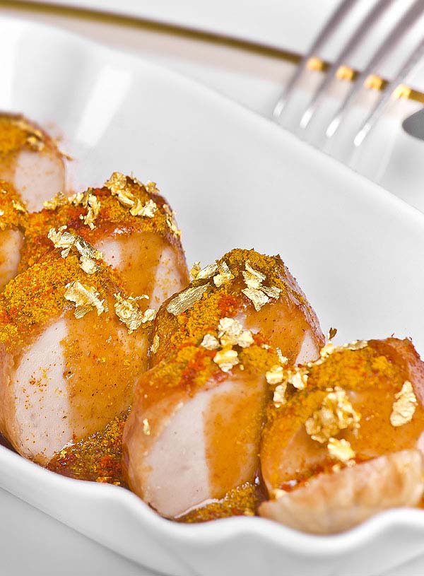 Currywurst mit Gold garniert